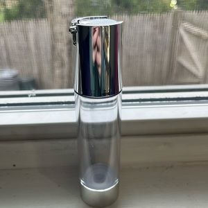 Empty skincare plastic pump bottle. Refillable